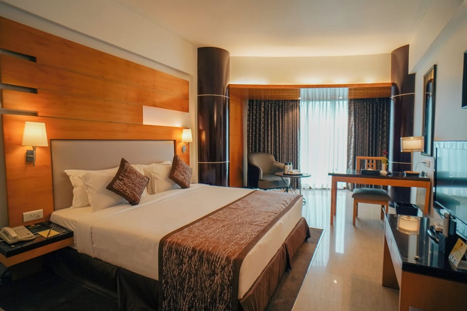 Deluxe Room | Premium bedding, minibar, in-room safe, desk