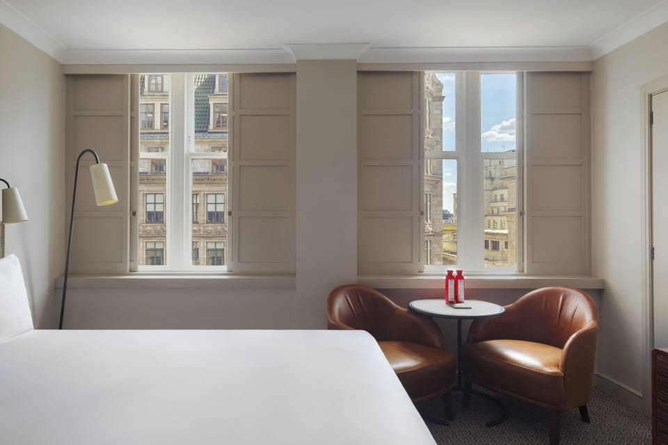 Superior King View | Premium bedding, blackout drapes, free WiFi, bed sheets