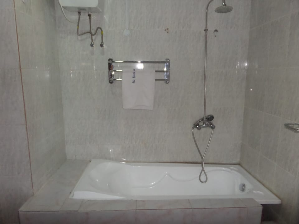Shower, rainfall showerhead, towels