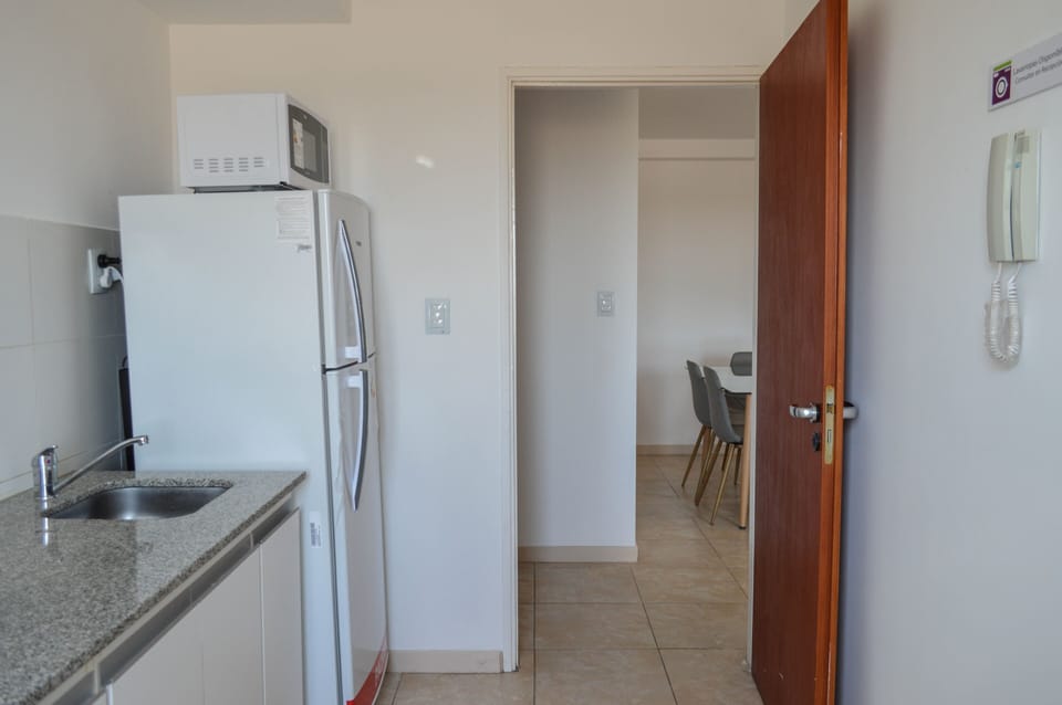 Apartment, 2 Bedrooms | Private kitchen | Fridge, microwave, stovetop, coffee/tea maker