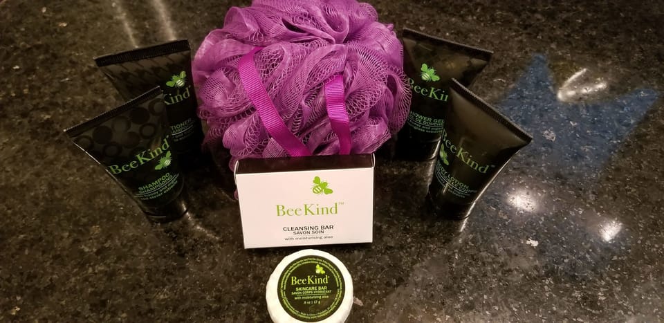 Designer toiletries, hair dryer, bathrobes, towels