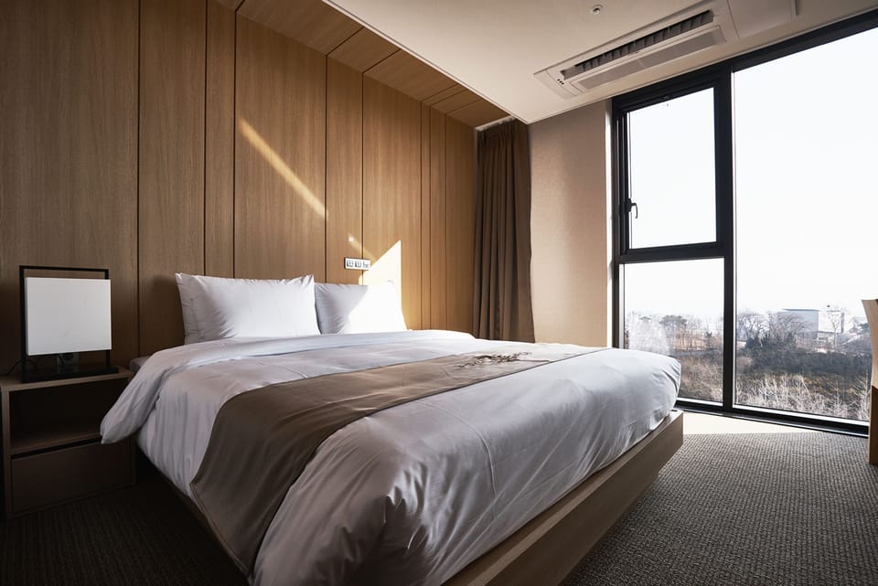 Deluxe Double Room (with Rail Bike) | Premium bedding, in-room safe, desk, laptop workspace