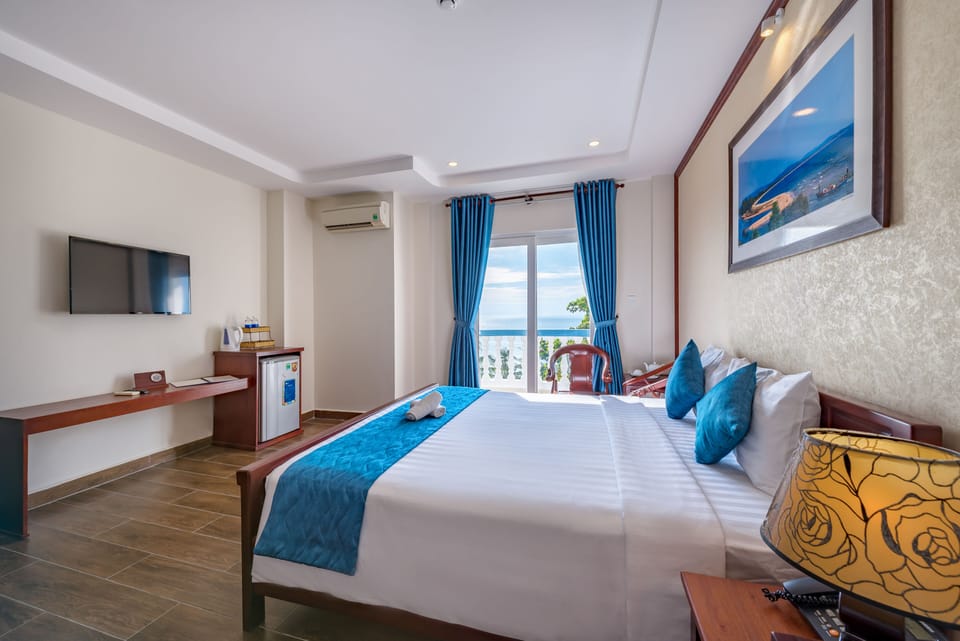 Premium Double or Twin Room, Sea View | Minibar, in-room safe, desk, laptop workspace