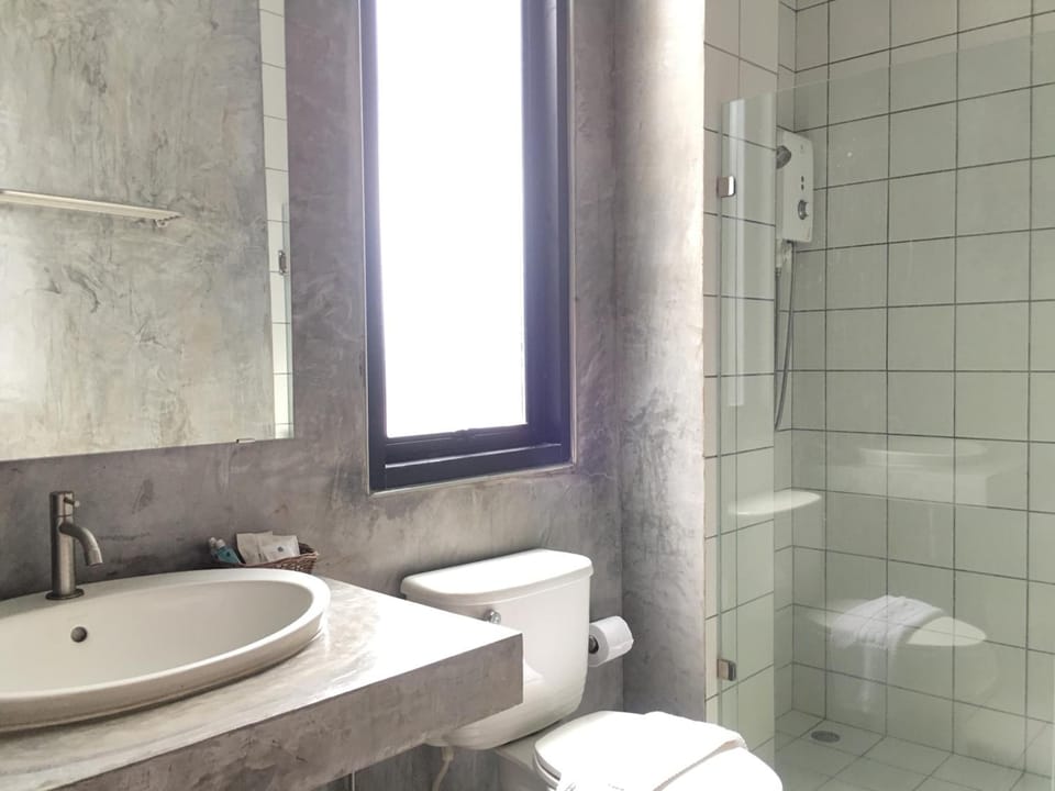 Shower, free toiletries, hair dryer, slippers