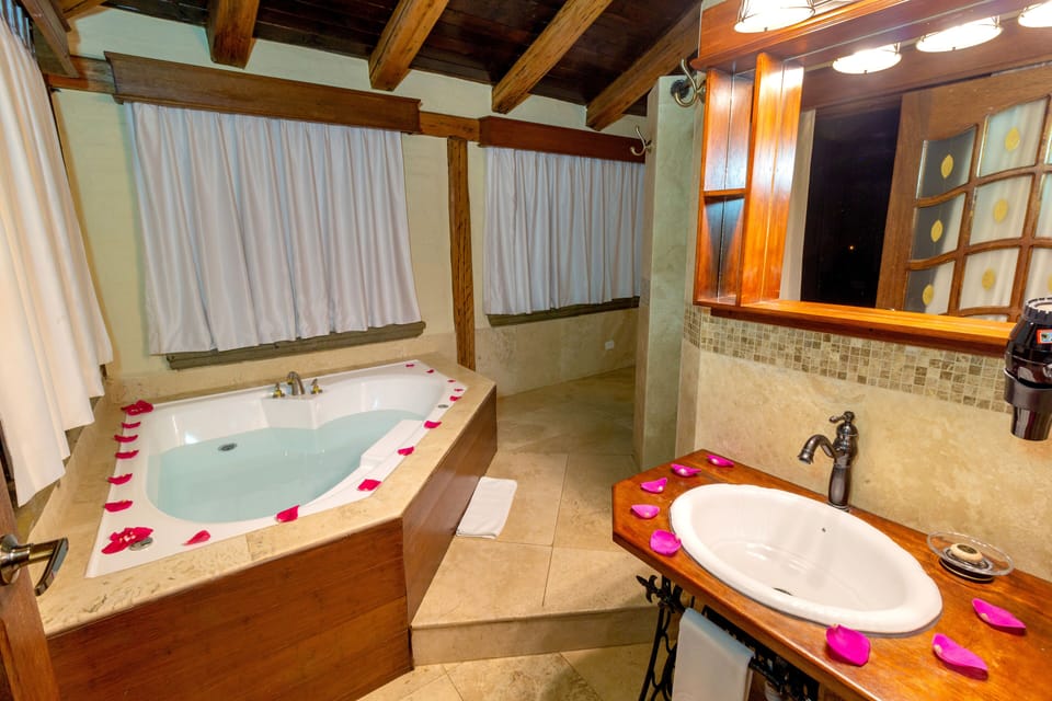 Junior Suite, Jetted Tub | Bathroom | Hair dryer, bathrobes, towels