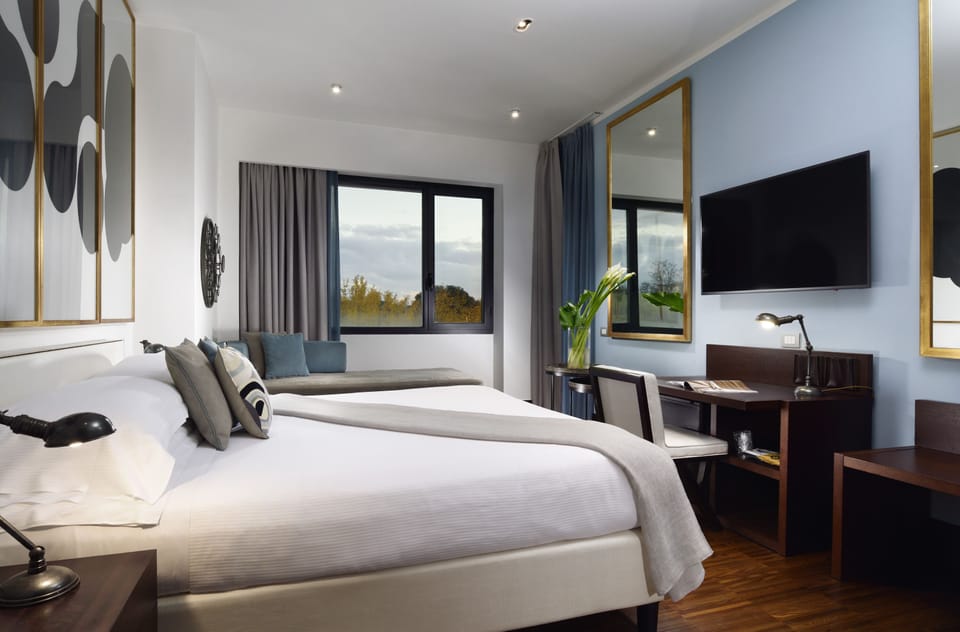 Triple Room | Premium bedding, down comforters, pillowtop beds, minibar