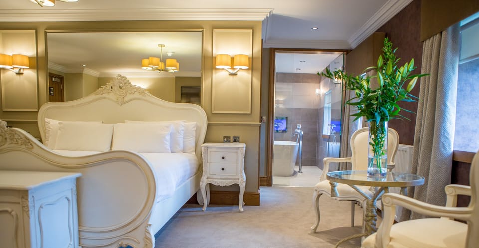 Premium bedding, down comforters, in-room safe, desk