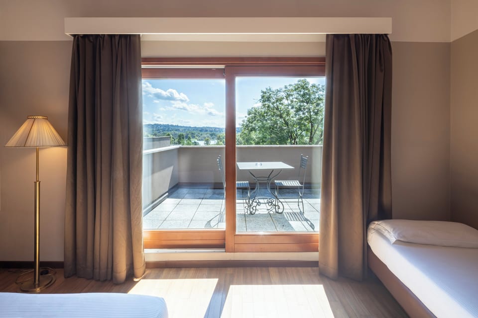 Superior Triple Room, Lake View | 1 bedroom, down comforters, minibar, in-room safe