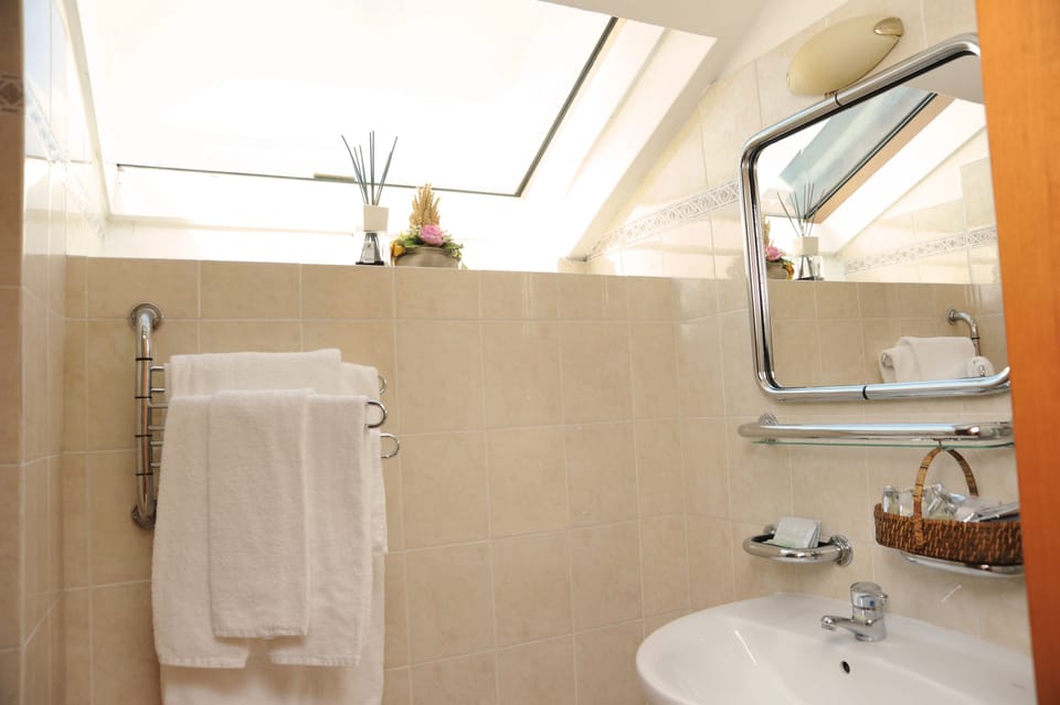 Bathroom | Shower, hair dryer, bidet, towels