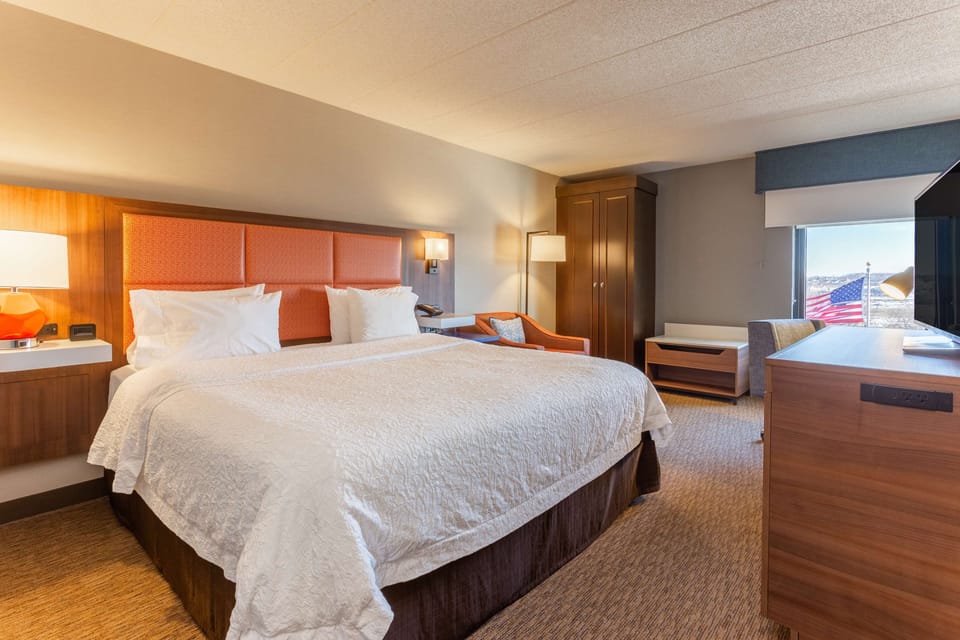 Premium bedding, desk, blackout drapes, iron/ironing board