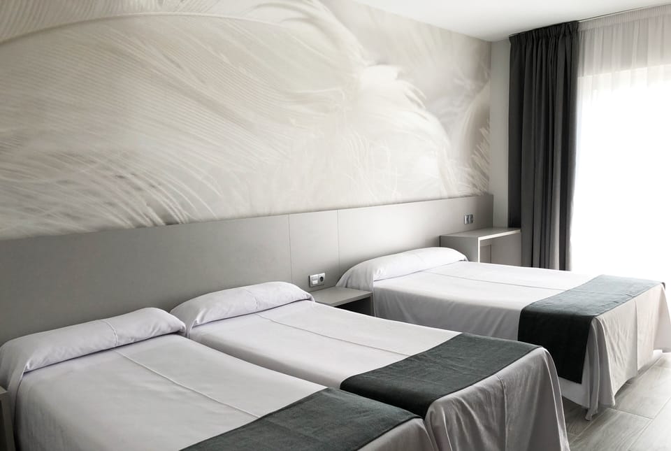 Desk, blackout drapes, WiFi (free), bed sheets