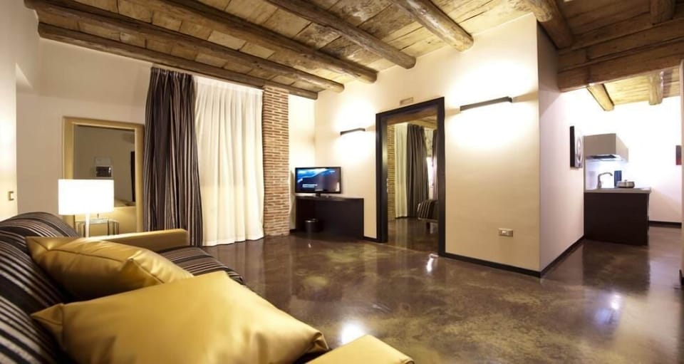 Apartment, 1 Bedroom | Minibar, in-room safe, desk, soundproofing