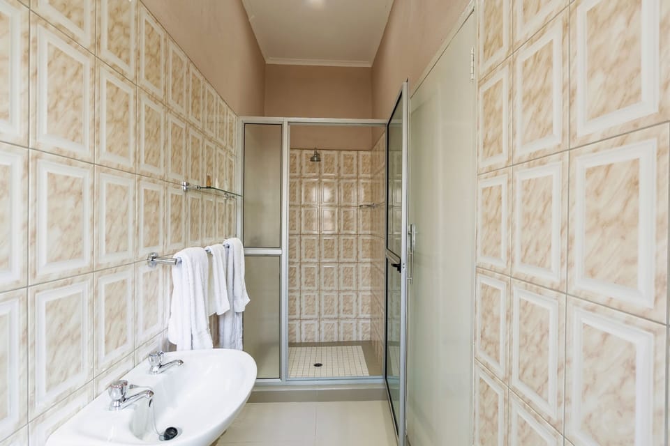 Shower, towels, soap, shampoo