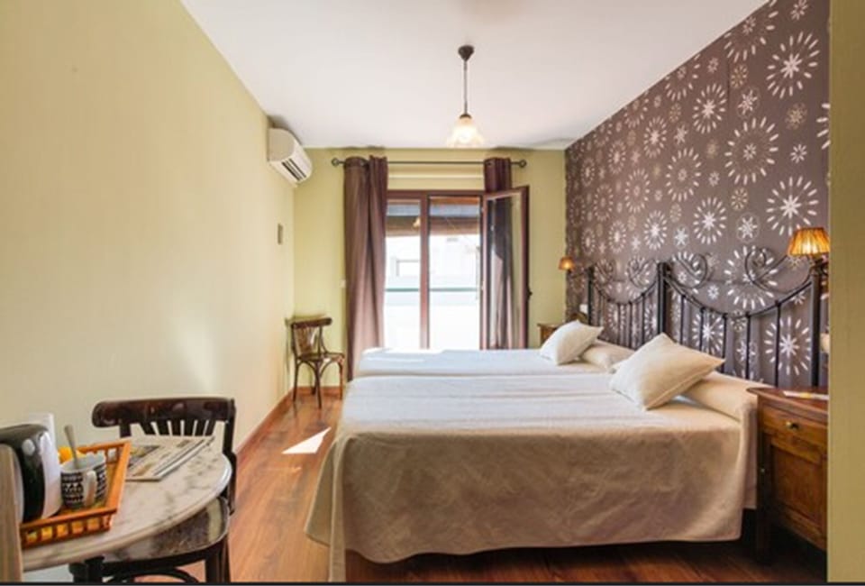 Classic Double Room | Minibar, in-room safe, individually decorated, blackout drapes