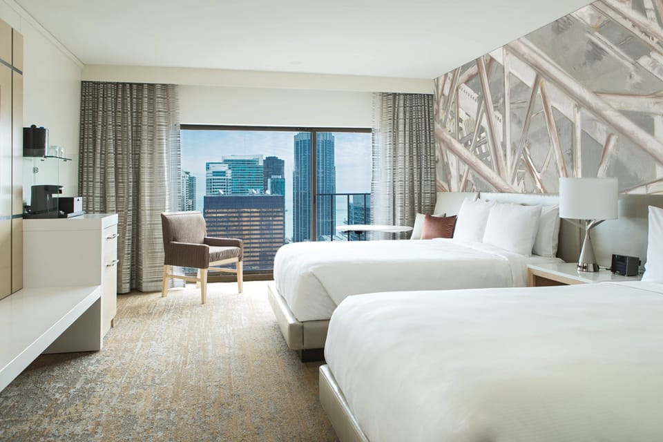 Premium bedding, down comforters, pillowtop beds, in-room safe