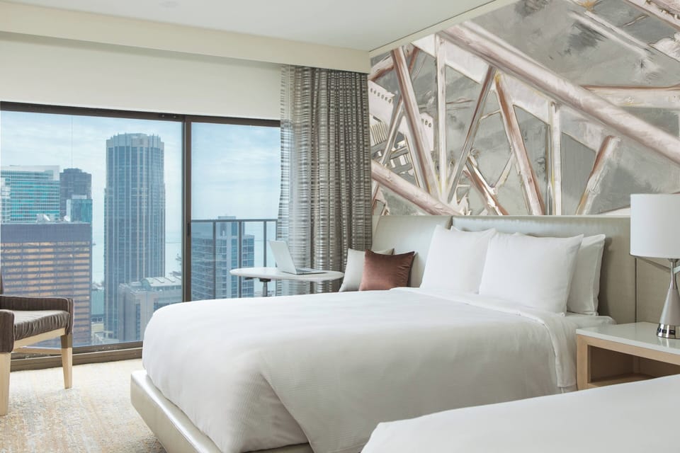 Premium bedding, down comforters, pillowtop beds, in-room safe