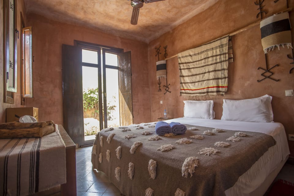 Suite (Ecolodge) | Iron/ironing board, bed sheets