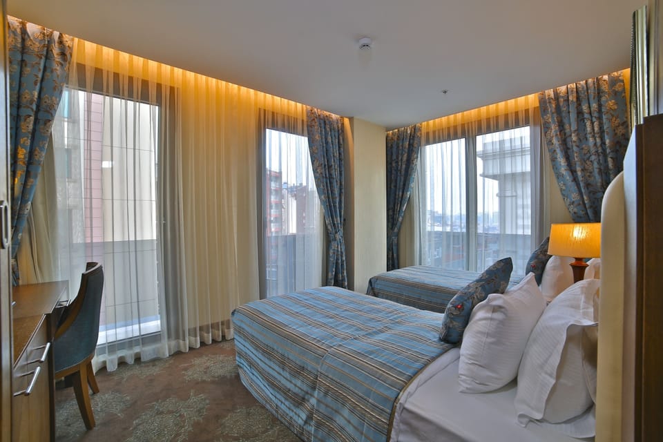 Family Suite, Connecting Rooms | Premium bedding, minibar, in-room safe, desk
