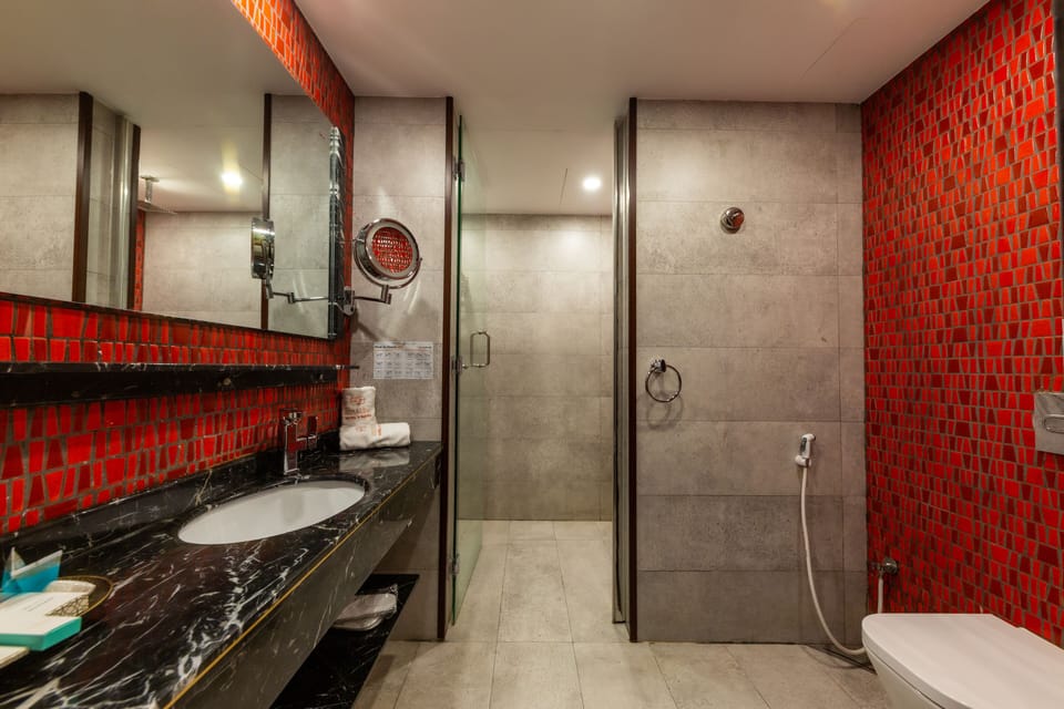 Designer toiletries, hair dryer, bathrobes, slippers