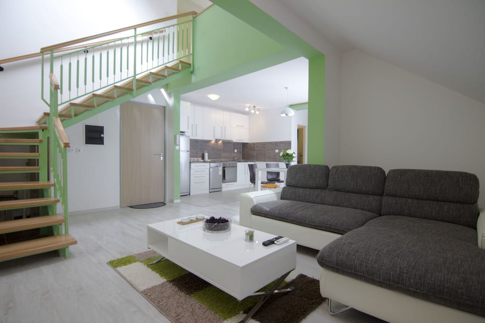 Duplex Two-Bedroom Apartment with Terrace | Living area | Flat-screen TV, heated floors