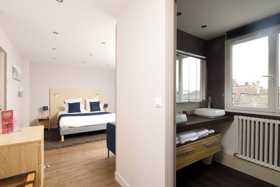 Family Room | Premium bedding, desk, blackout drapes, soundproofing