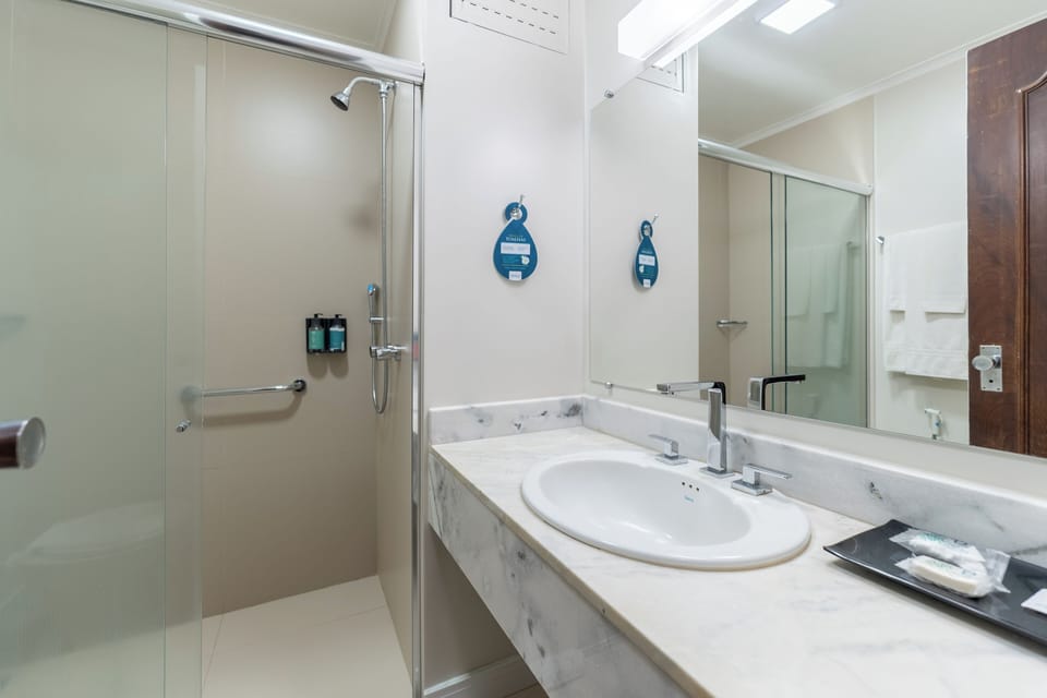 Shower, free toiletries, hair dryer, towels