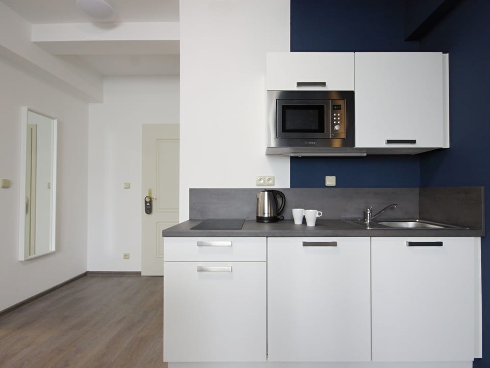 Junior Suite | In-room safe, desk, iron/ironing board, free WiFi