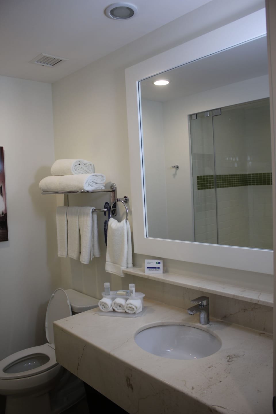 Rainfall showerhead, free toiletries, hair dryer, towels