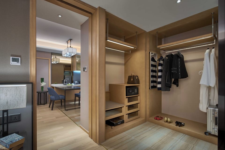 Suite, 1 King Bed | Living area | 43-inch LCD TV with satellite channels, TV