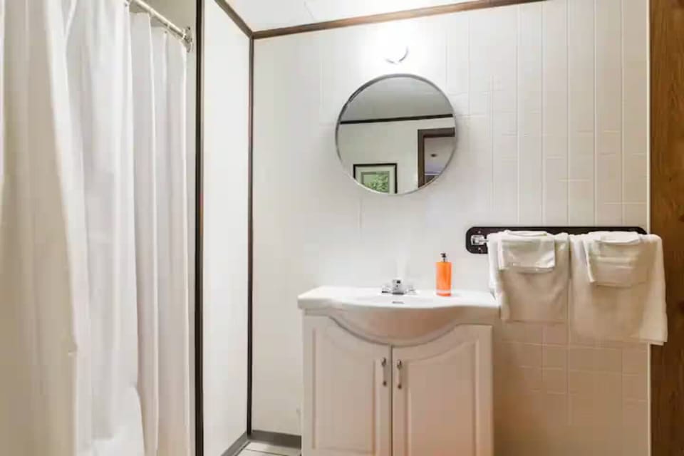 Family Room, 2 Double Beds | Bathroom | Hair dryer, bathrobes, towels