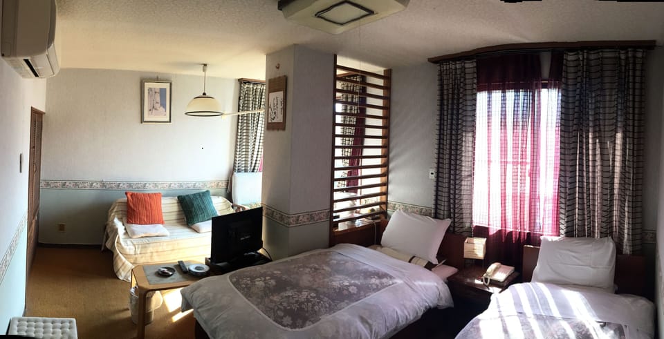 Western Style Room with Private Bathroom, Non Smoking | Minibar, desk, free WiFi, bed sheets