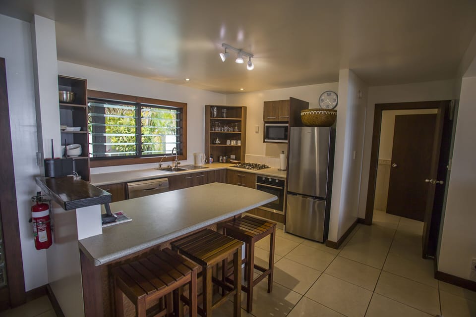 One Bedroom Villa - Beachfront | Private kitchen | Full-size fridge, microwave, oven, stovetop