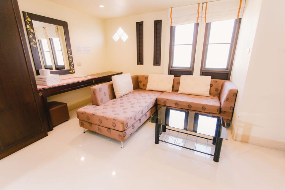 Deluxe Room, 2 Double Beds | Living room | 42-inch TV with cable channels