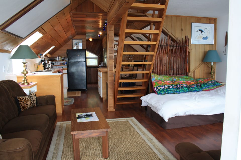 Comfort Apartment, Ocean View, Beachfront | Living area | 55-inch TV with cable channels