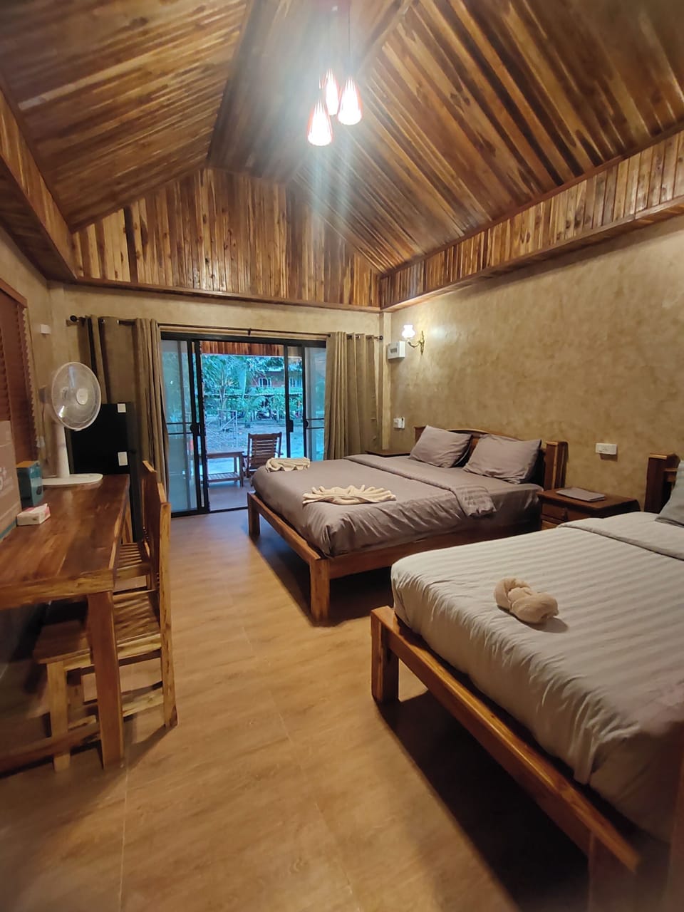 Comfort Triple Room, Refrigerator, Garden Area | Desk, laptop workspace, bed sheets