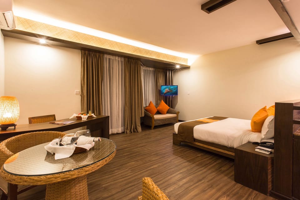 Super Deluxe Room with Patio | Minibar, desk, iron/ironing board, free WiFi