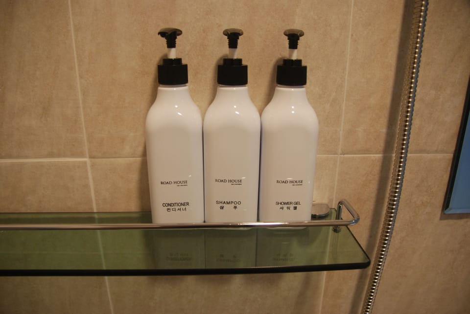 Shower, free toiletries, hair dryer, slippers