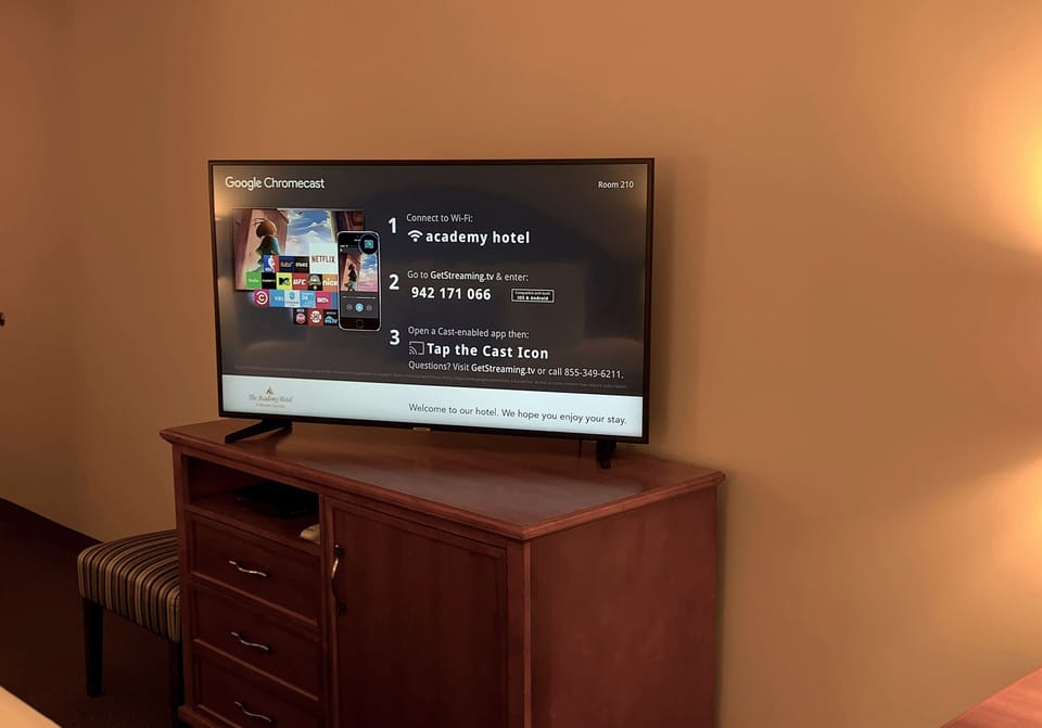 Premium bedding, desk, blackout drapes, iron/ironing board