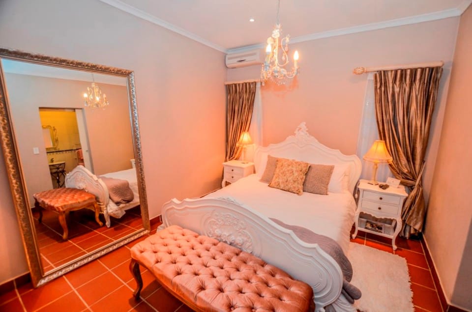 Deluxe Room, 1 Bedroom | Minibar, in-room safe, desk, soundproofing