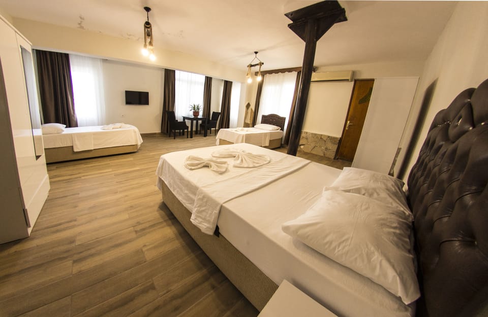 Comfort Quadruple Room | Premium bedding, free WiFi, bed sheets