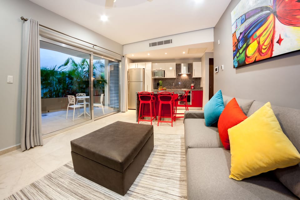 Deluxe Condo, 1 Bedroom, City View, Courtyard Area | Living area | Flat-screen TV
