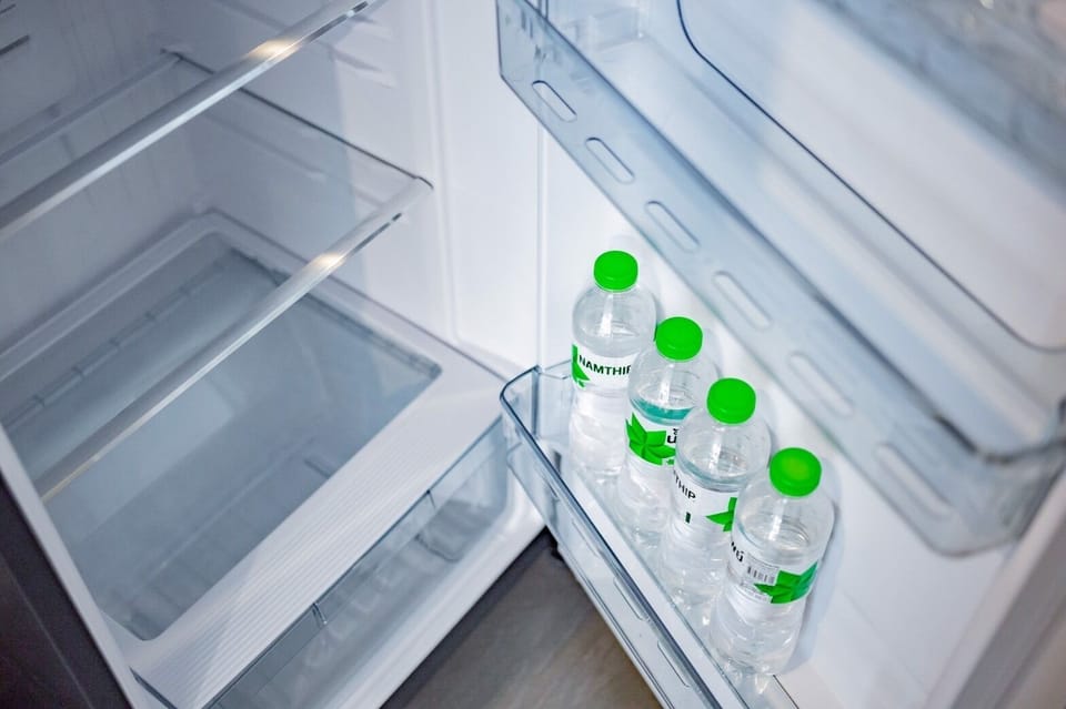Deluxe Suite | Private kitchen | Fridge, microwave, coffee/tea maker, electric kettle