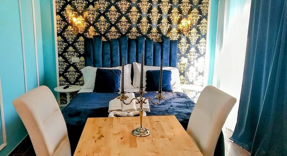 Deluxe Room | Individually furnished, desk, iron/ironing board, free WiFi