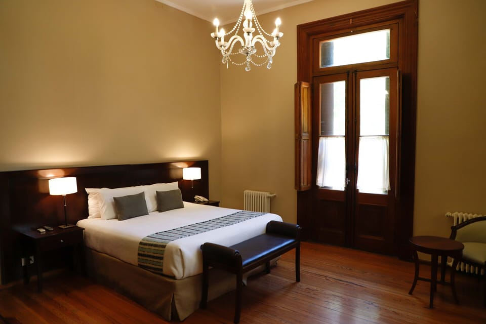 Superior Suite, 1 King Bed | Minibar, in-room safe, desk, iron/ironing board