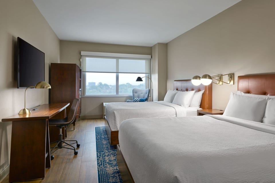 Premium bedding, down comforters, pillowtop beds, in-room safe