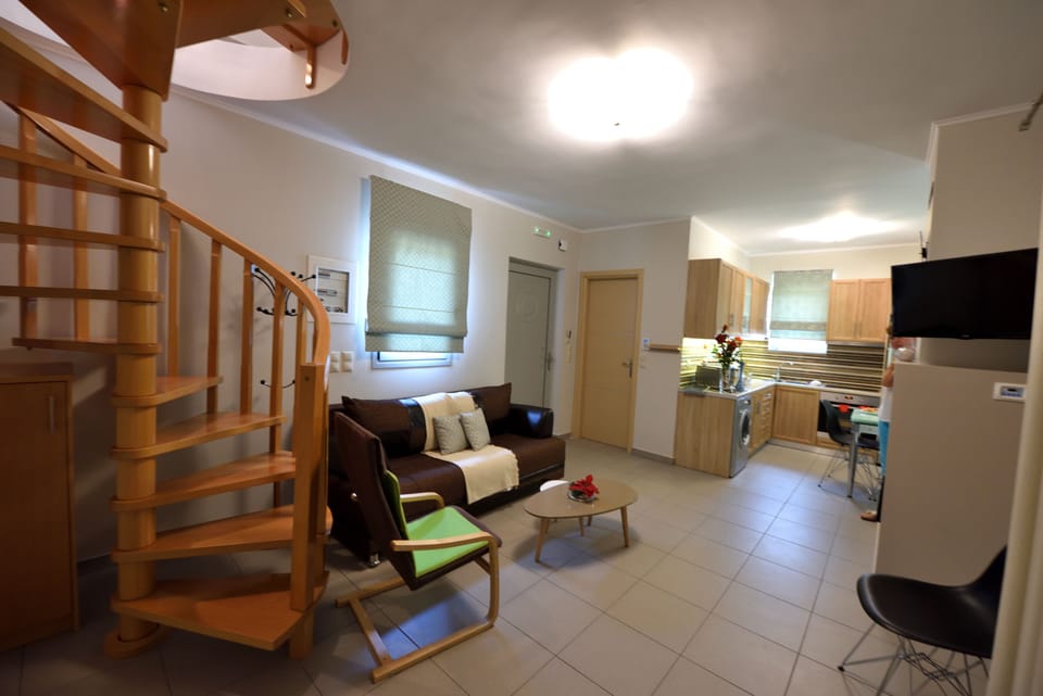 Family Duplex | Living area | Flat-screen TV, fireplace