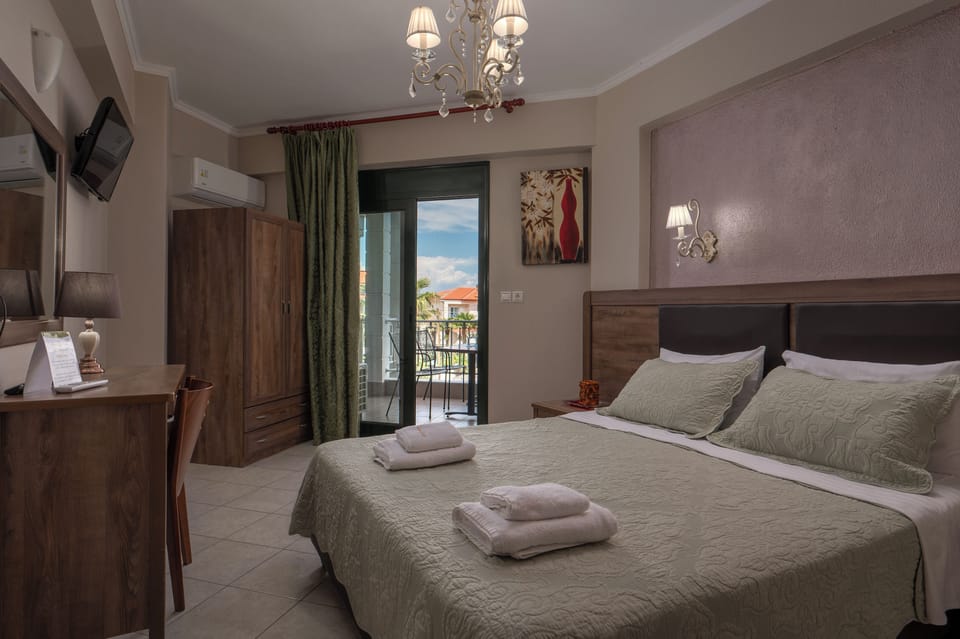 Studio, Garden View | In-room safe, desk, iron/ironing board, free cribs/infant beds