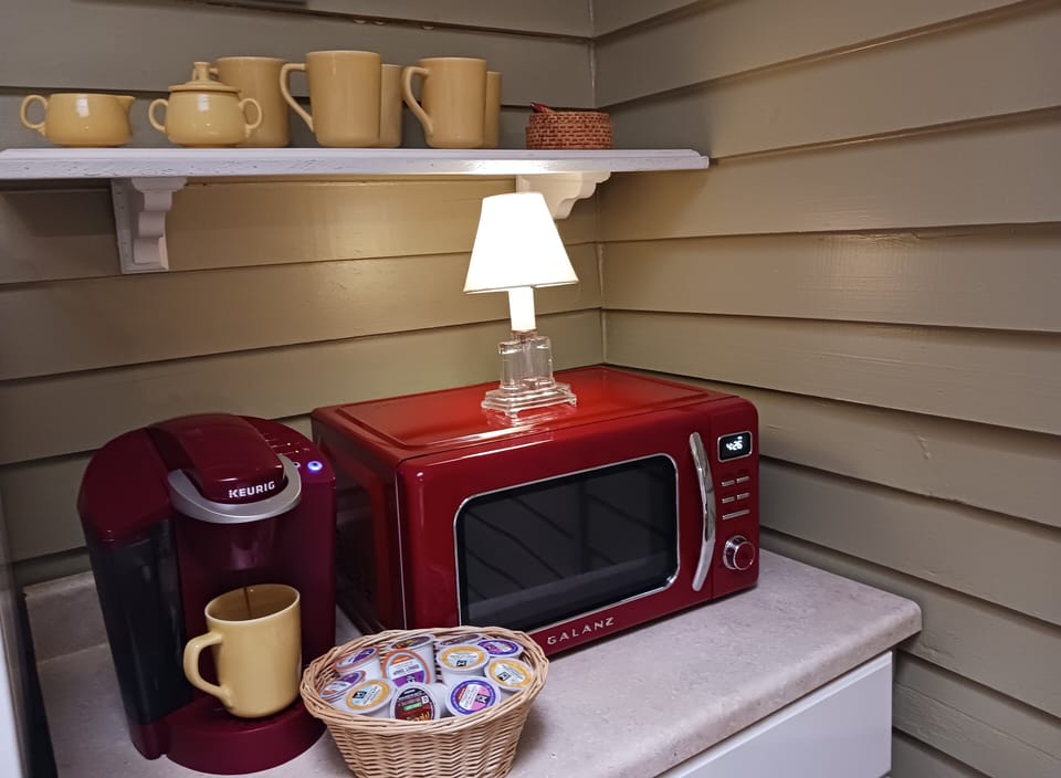 Fridge, microwave, coffee/tea maker, toaster