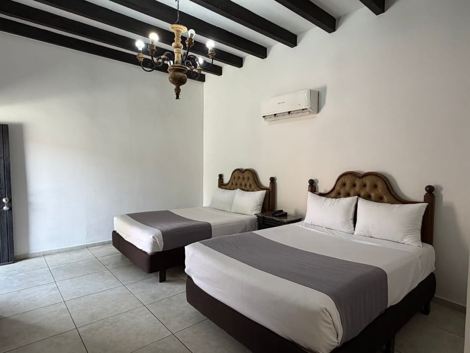 Standard Room, 2 Double Beds | Desk, iron/ironing board, free WiFi