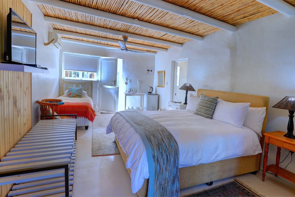 Deluxe Triple Room, Poolside (Deluxe) | Premium bedding, pillowtop beds, minibar, individually decorated